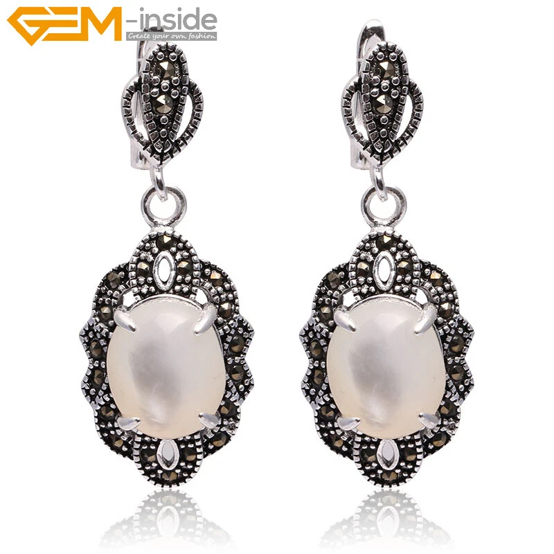 Pendientes colgantes con clip de joyería cuentas ovaladas piedras surtidas de marcasita de plata Foto 3 de 4