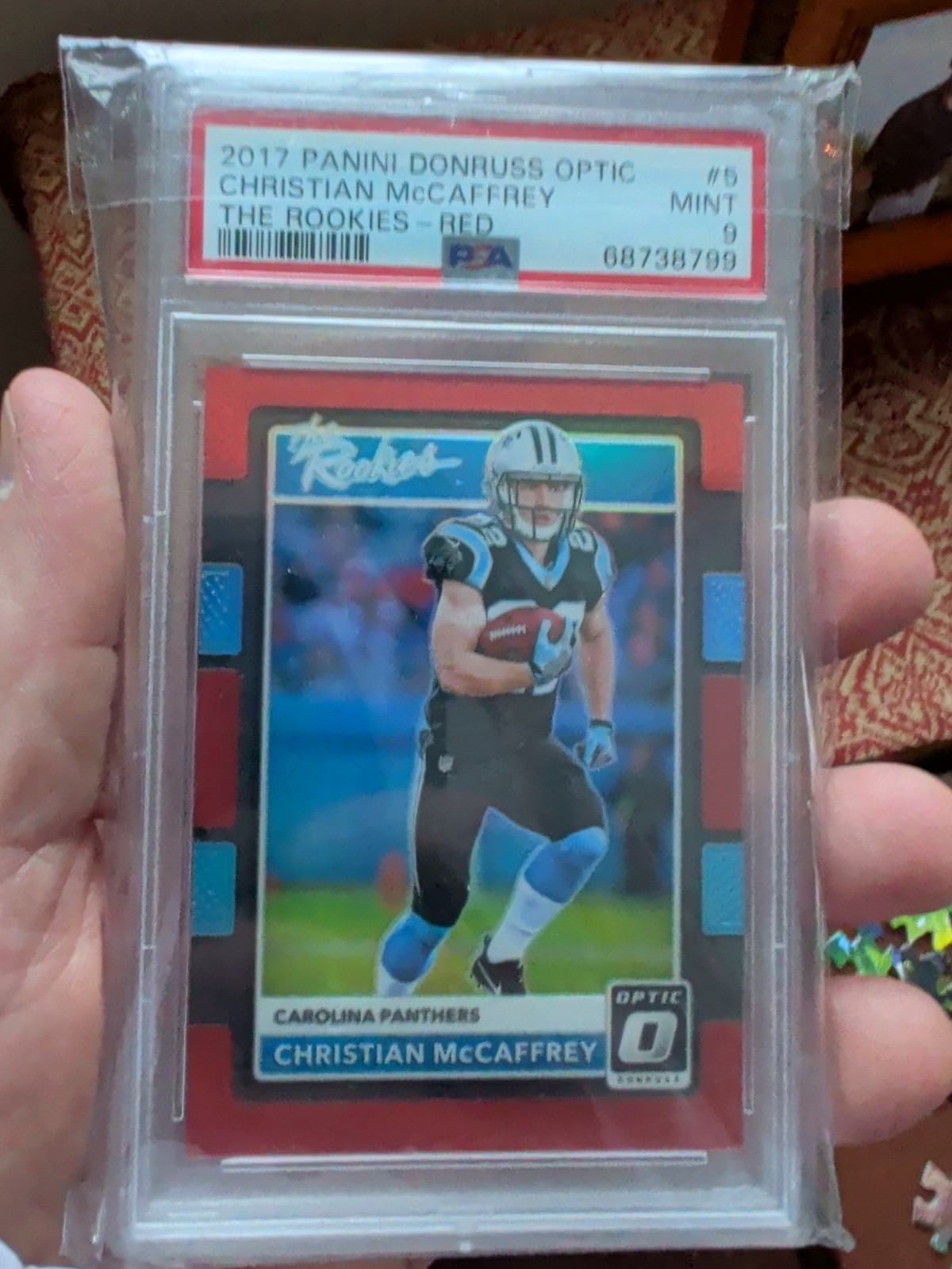 2017 Donruss Optic - The Rookies Christian McCaffrey #5 Red Prizm /99 (RC) PSA 9