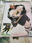 RUSS COURTNALL OR ALEXANDER MOGILNY  POSTER COLOR  8 BY 11  inches BECKETT 1993