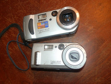 Two Sony Cyber-shot Digital Camera Silver - FOR PARTS OR REPAIR - Untested