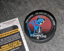 Oliver Ekman-Larsson SIGNED FLORIDA PANTHERS 2024 STANLEY CUP CHAMPIONS PUCK JSA