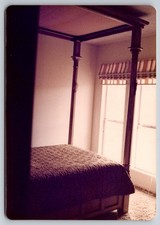 Vintage Photo Dark Wood Four Poster Canopy Bed in Bedroom Interior 1970s