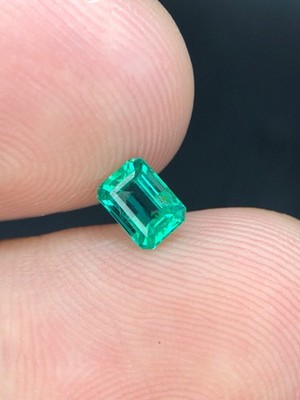 0.55 Cts Natural Emerald Green Color Emerald Cut loose gemstone