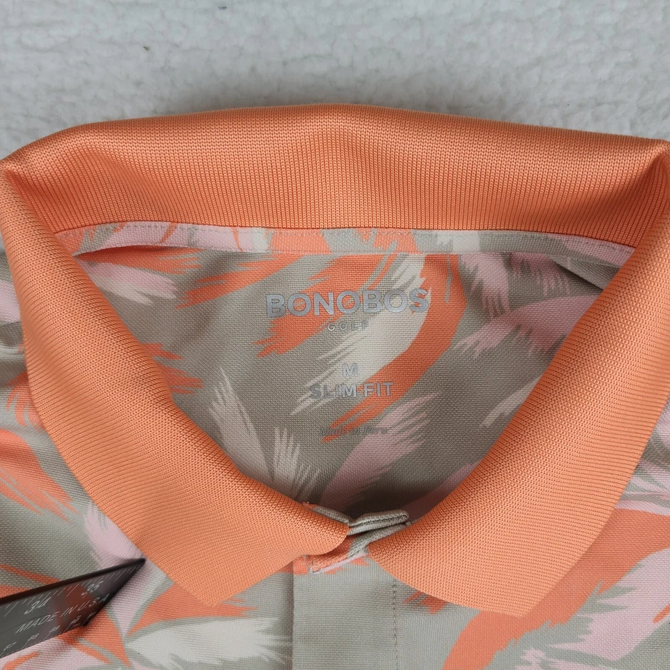 Polo de golf Bonobos para hombre mediano naranja rosa rendimiento floral hawaiano Foto 3 de 4