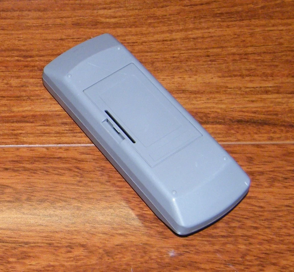 Genuine Sharp (RRMCG0219AWSA) Audio System Remote Control w/ Battery Cover - Image 2 of 4