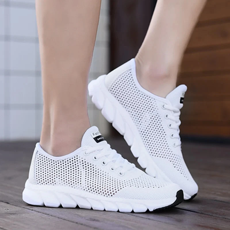 New Mesh Women Sneakers Breathable Flat Shoes Women Lightweight Sports Shoes
Opens in a new window o