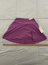 Blogilates Womens Crisscross Slit Skort First Bloom Size L pockets  Gymwear NWT