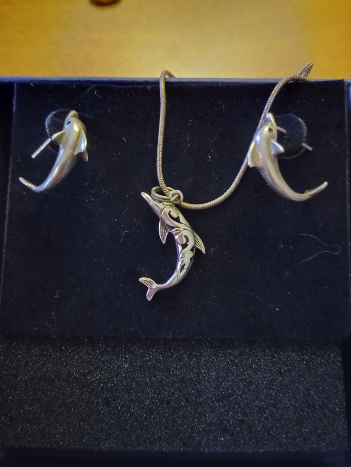 Solid silver 18" necklace and earrings.  Dolphin … - image 1
