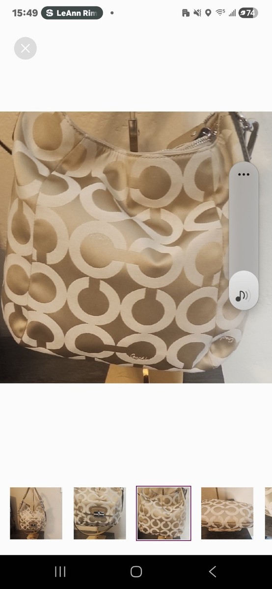 Stylish Coach shoulder bag. Features signature pattern. Secure