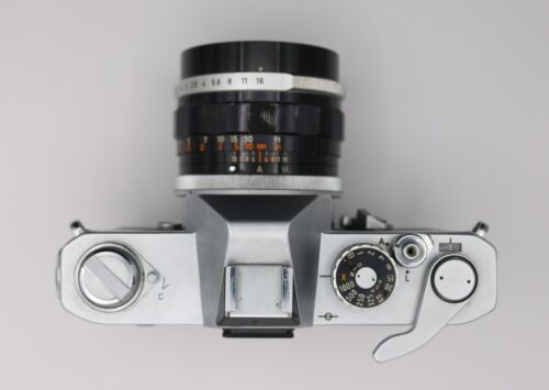 Canon FT QL 35mm fotocamera reflex pellicola + obiettivo 50mm f/1.4 FL II - testata e funzionante - Foto 3 di 21