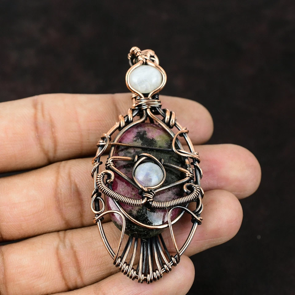 Colgante madre mal de ojo envuelto en alambre de piedra lunar arco iris rodonita natural de cobre Foto 3 de 4