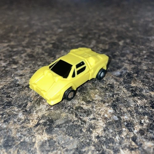 Vintage 1988 Transformers G1 Figure Micromaster Freewheeler Yellow Car Race Team