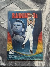 2022-23 Panini Donruss Optic - Raining 3s Luka Dončić #7 Red & Gold Wave #11/99