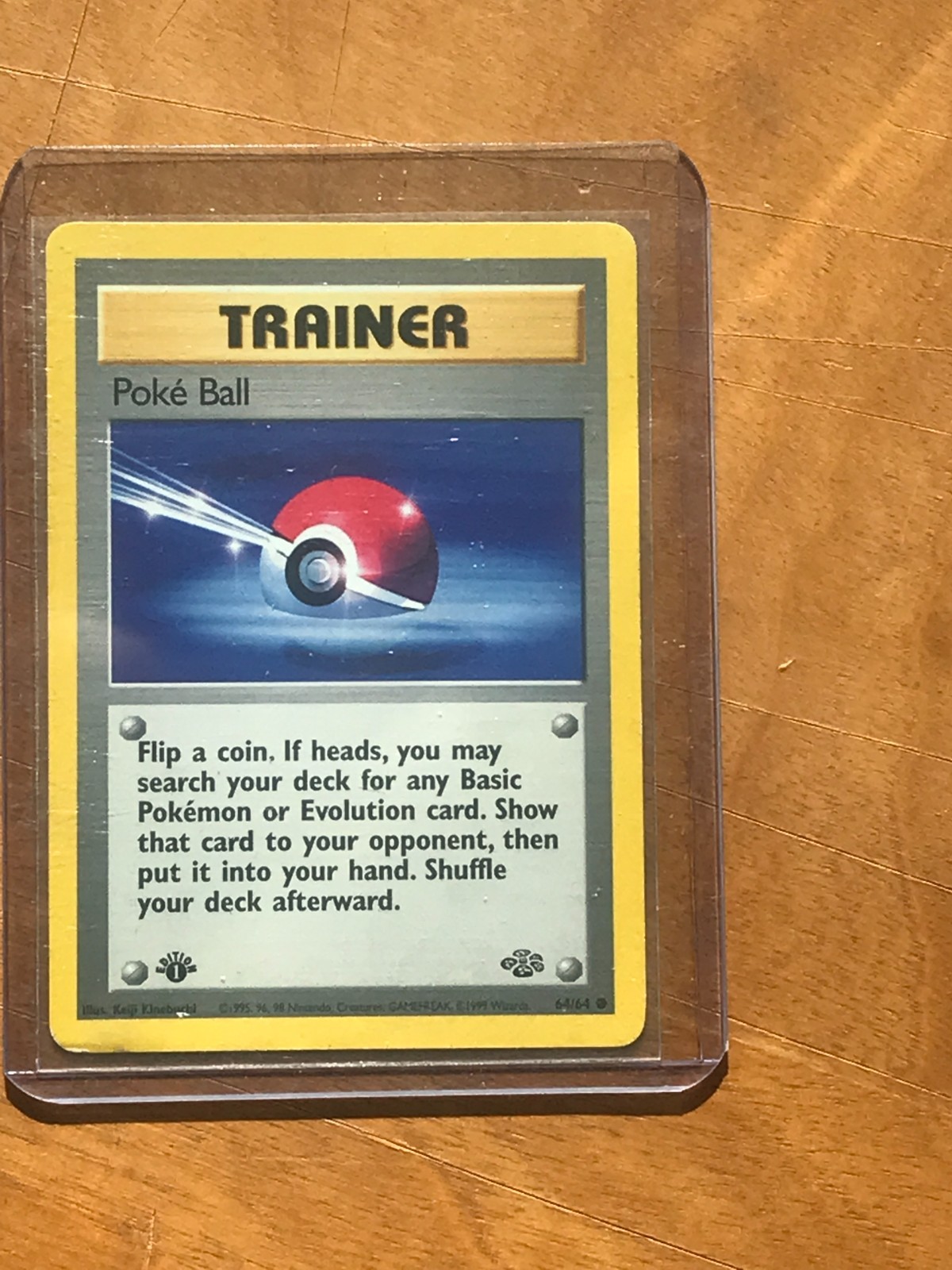 1st Edition Poke Ball 64/64 - Jungle - Common Pokemon Card - Near Mint (NM)