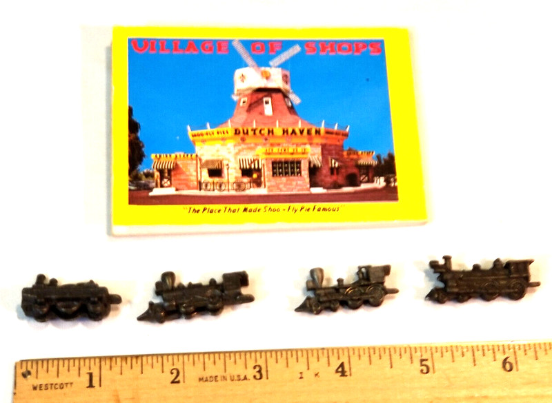 4 METAL LOCOMOTIVE MODELS and (unrelated) BOOKLET showing wood locomotive models