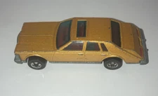 Hot Wheels Cadillac Seville Gold Black Walls 1980 Hong Kong