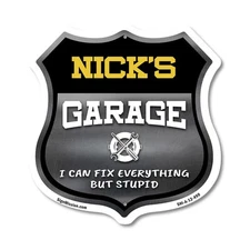 Nick's Garage I Can Fix Everything But Stupid Shield Shaped Sign Made in the USA