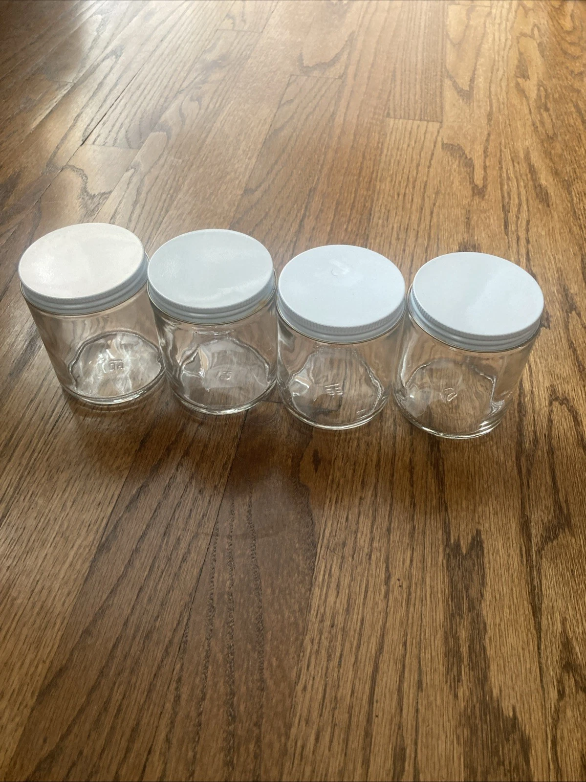 Lot of 4 - 4 oz. Glass Bait Jars With Metal Lids