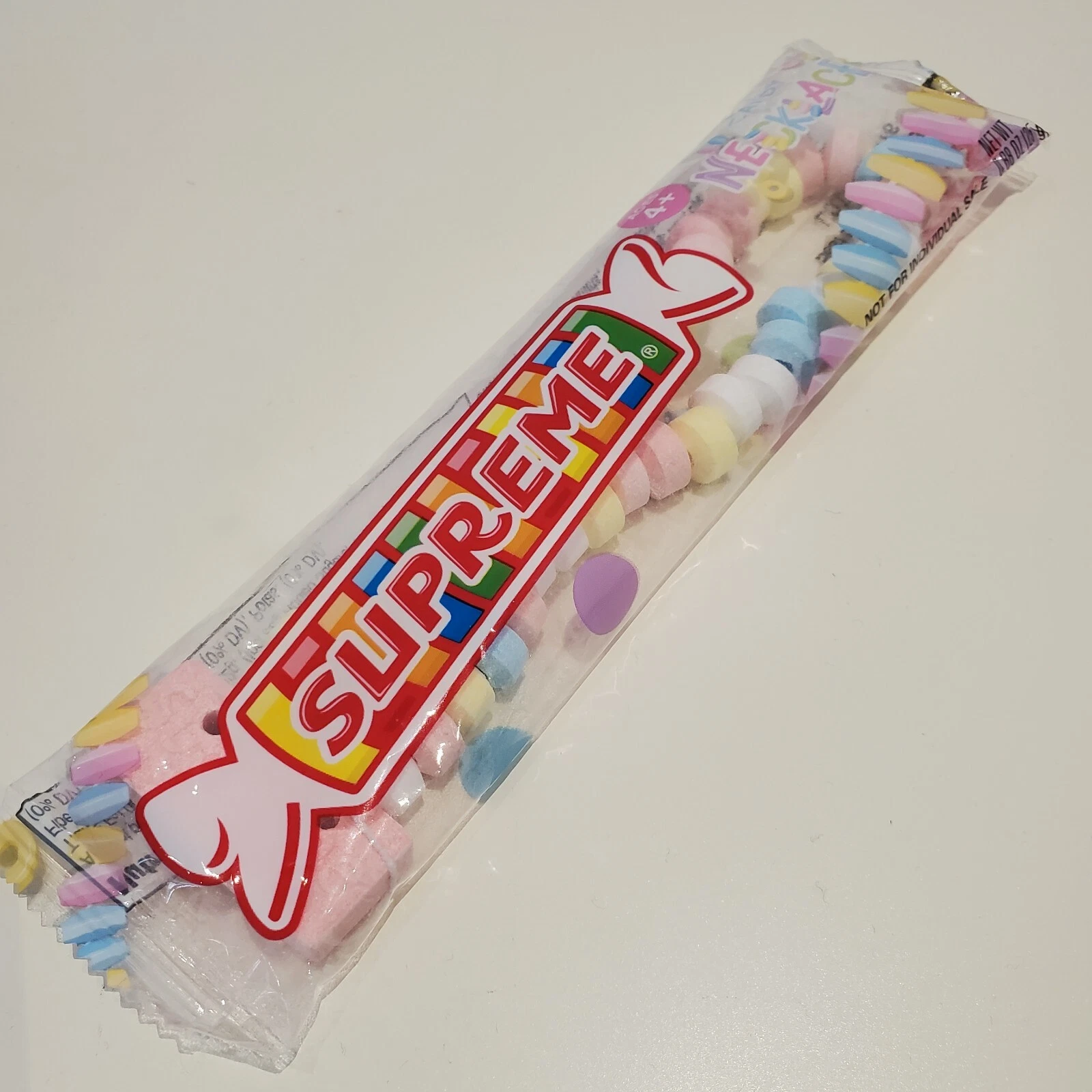 *NEUF SCEAU EN MAIN* Collier bonbons Supreme Smarties SS22 semaine 1 cadeau
