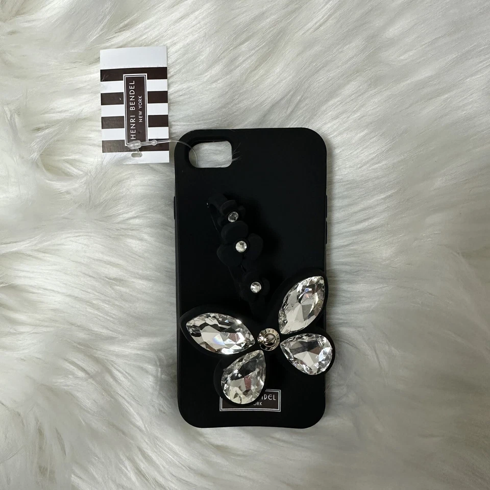 Funda con anillo de mariposa de silicona Henri Bendel nueva con etiquetas para iPhone 6/7 Foto 2 de 4
