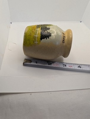 hand-painted pottery jug signed by the artist W. Ames