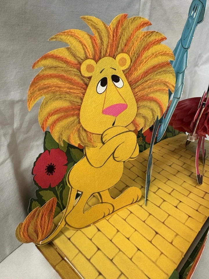 Centro de mesa de fiesta de papel vintage con sello de los años 70 Mago de Oz Foto 2 de 4