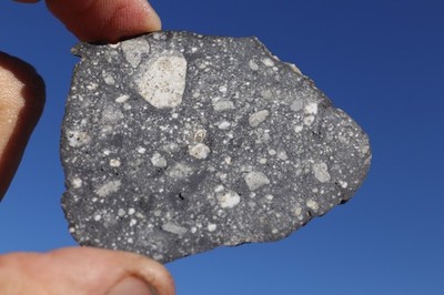 Aridal 017 Lunar  meteorite   Weight 11.72 grams  feldsp. breccia, great looker!