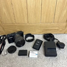 Canon EOS M Mirrorless Camera Kit with 18-55mm Lens + Flash Gun + 2 Batteries