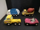 Y11-TONKA,BUDDY L LOT OF FOUR MODELS INC CEMENT MIXER