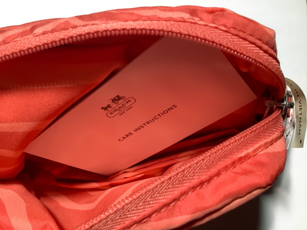 Coach Poppy F67855 Packable Zip Folding Zebra 14 Coach Poppy F67855 Packable Zip Folding Zebra 14