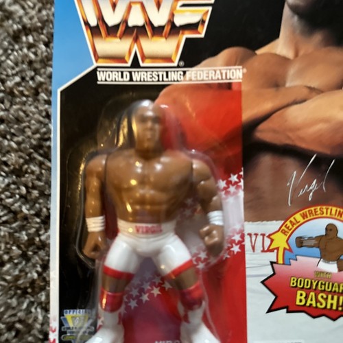wwf/wwe hasbro virgil figure moc with protective c...
