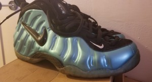 black and turquoise foamposites