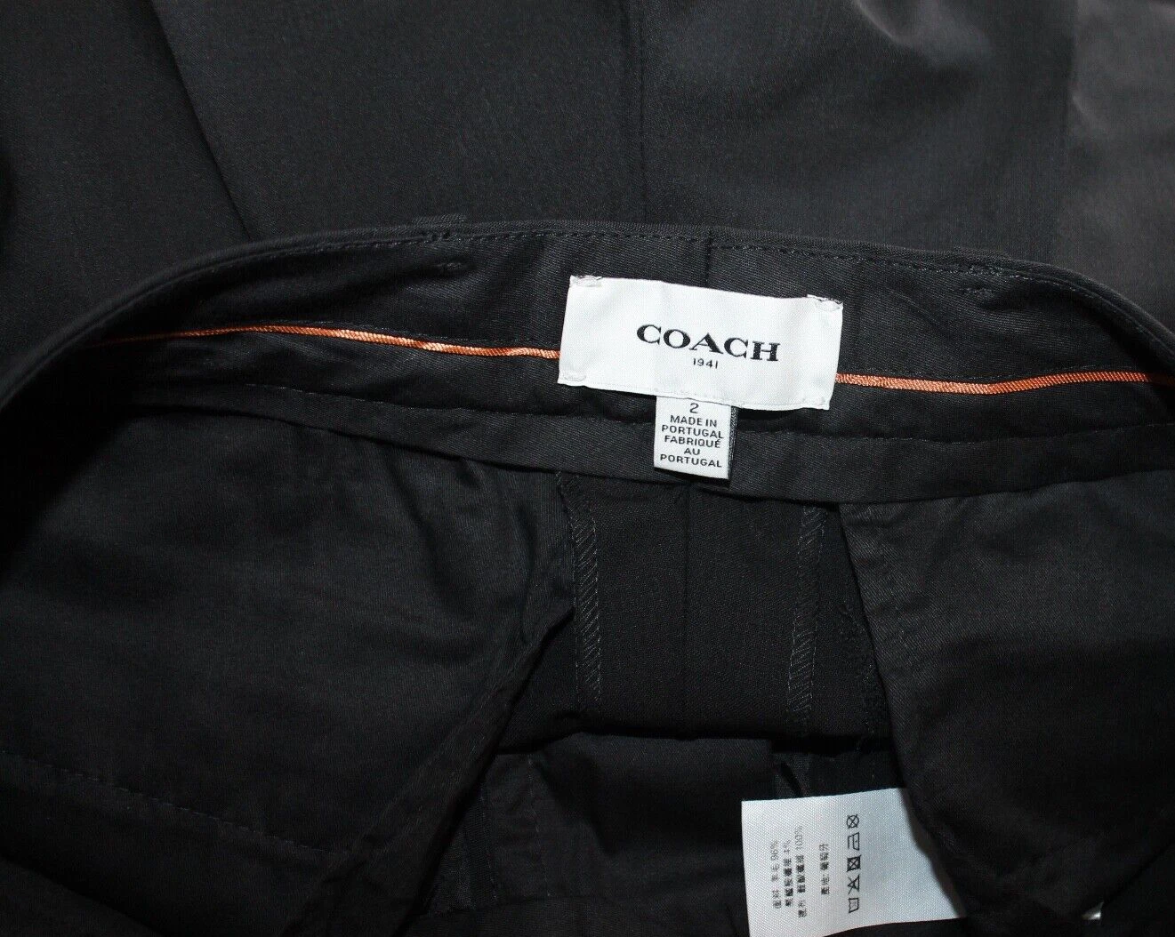 Pantaloni da donna neri Coach taglia 2 misto lana pantaloni piatti di design anteriori