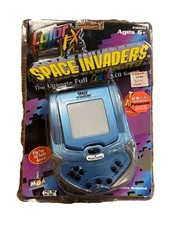 Space Invaders Color FX Pop-up Handheld LCD Game 236603 MGA 1999 factory, sealed