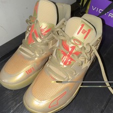 PUMA Men s KAI 1 Gold Athletic Sneaker Mesh U...