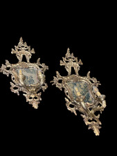 Coppia di antiche specchiere con applique  in legno intagliato e argentate XX...