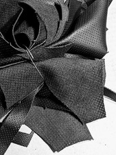 Black Perforated leather Scraps for Crafting. 15oz. Count