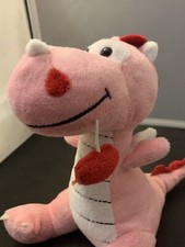 Pink dragon plush with red heart hanging from mouth 6 inches high