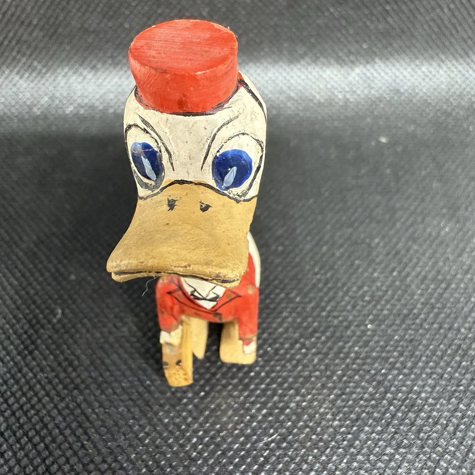 Antigua estatuilla de madera pintada tallada del pato Donald Bellhop arte popular RARA Disney Foto 2 de 4