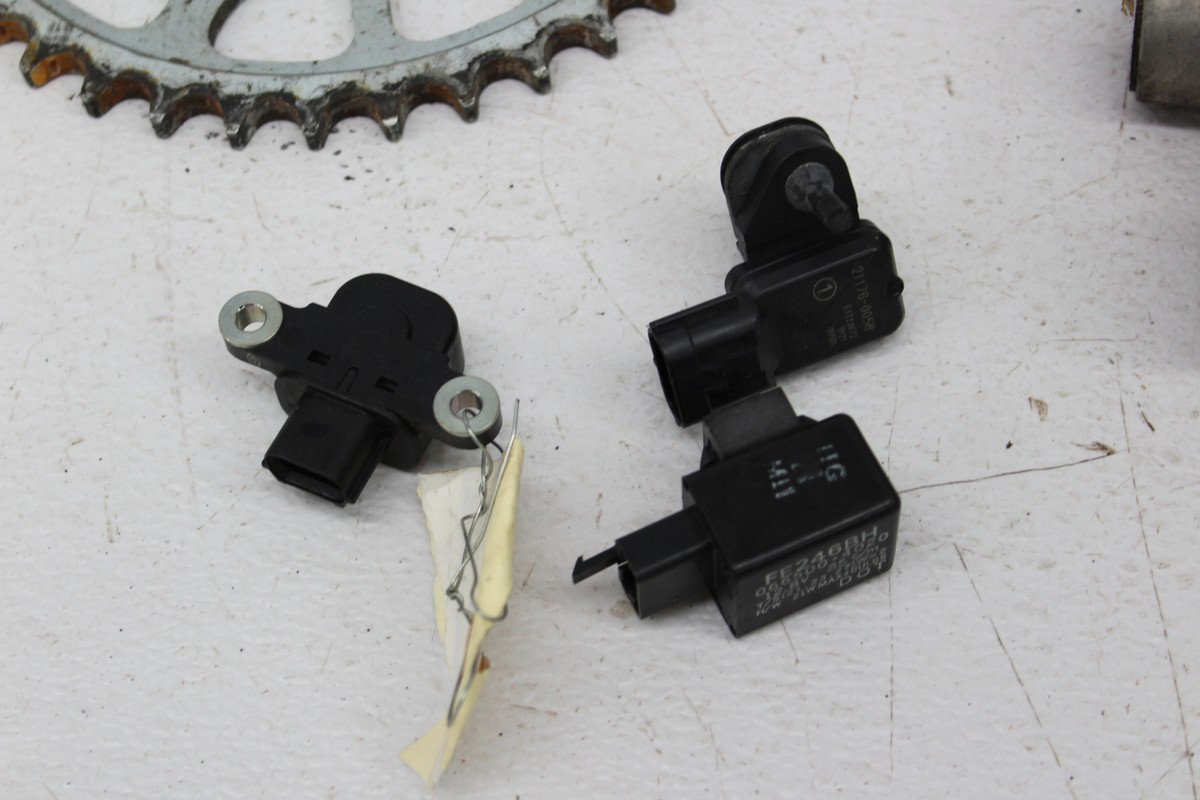06 KAWASAKI ZX10 PARTS LOT SENSORS LATCHES SPROCKET AXEL