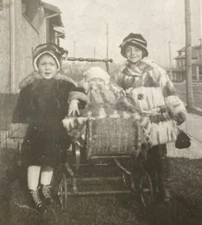 1922 Young Children Pushing Baby in Carriage Sidewalk Street Real Photo P13o5