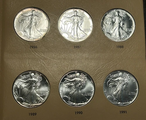 1986 TO 1996 BU SILVER EAGLE COLLECTION / 11 COINS IN DANSCO ALBUM