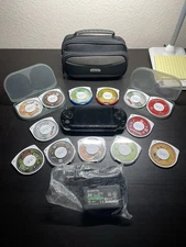 PSP-1001 PlayStation Portable - Black w/ 2GB Memory. Charger, Travel Case, Games