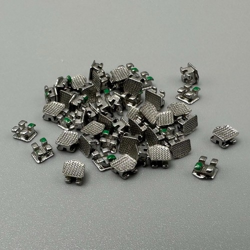 50 pezzi staffe ortodontiche dentali staffe STD MBT 022 slot 3 ganci metallo sfuso - Foto 18 di 24