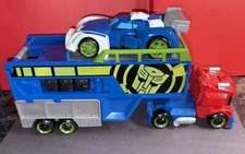 Transformers Rescue Bots Optimus Prime Racing Trailer~with Cool-Blue Blurr~MINT