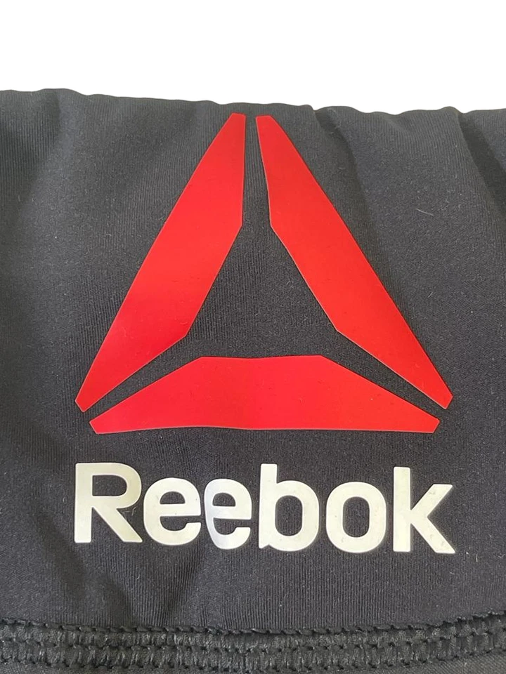 Pantalón corto Reebok UFC para mujer octágono en blanco negro/grava - 32" Foto 4 de 4