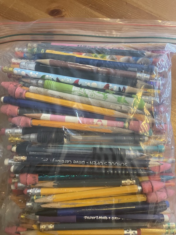 lot of pencils new and used mechnical and some colored erasures and sharpener