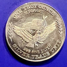 1 Troy Oz. .999 Fine Silver  round ~ Flying Eagle  / Scales  AU condition
