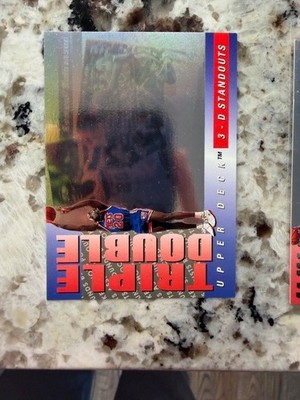 1993-94 UPPER DECK NBA TRIPLE DOUBLE INSERT CARD NETS RUMEAL ROBINSON #TD9