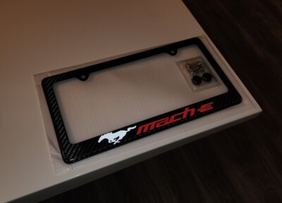 Carbon Fiber Look License Plate Frame – Red Text – Fits Front Or Rear